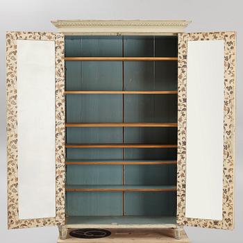 A late Gustavian cabinet, early 19th century.