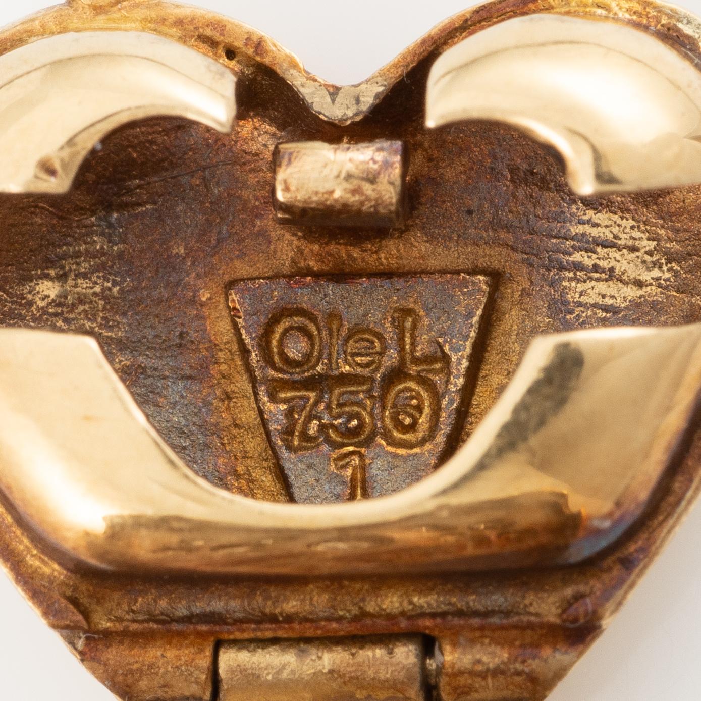 Necklace, Ole Lynggaard, with heart-shaped clasp in 18K gold set with brilliant-cut diamonds, chain in silver with four strands.