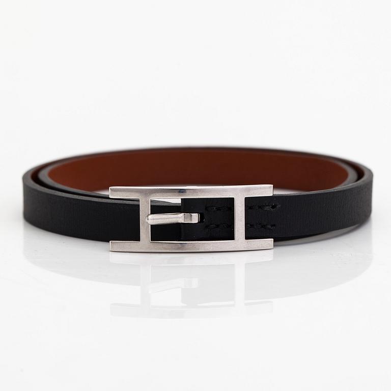 Hermès, a 'Behapi Double Tour' leather bracelet.