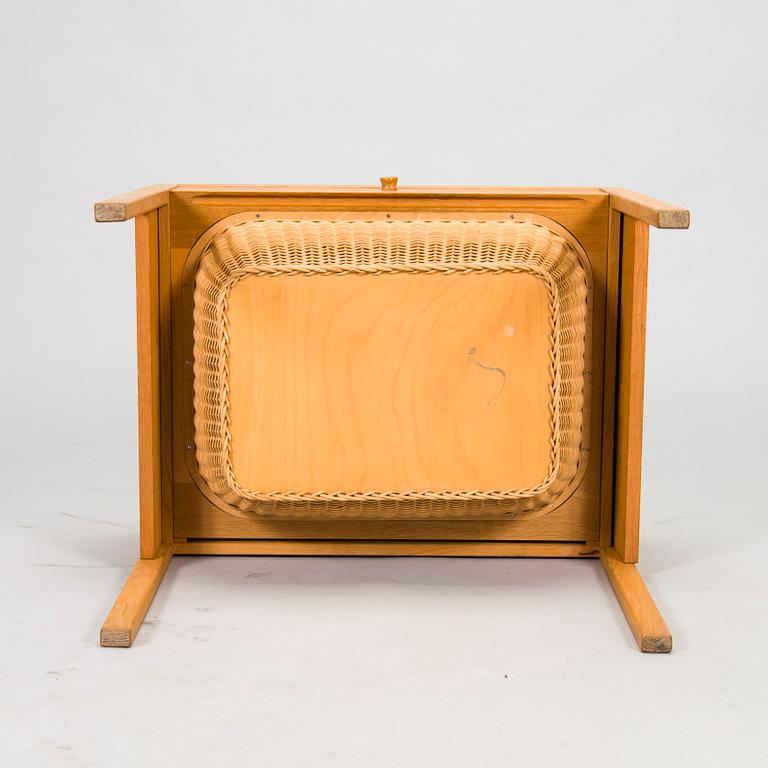 A mid-20th-century sewing table.