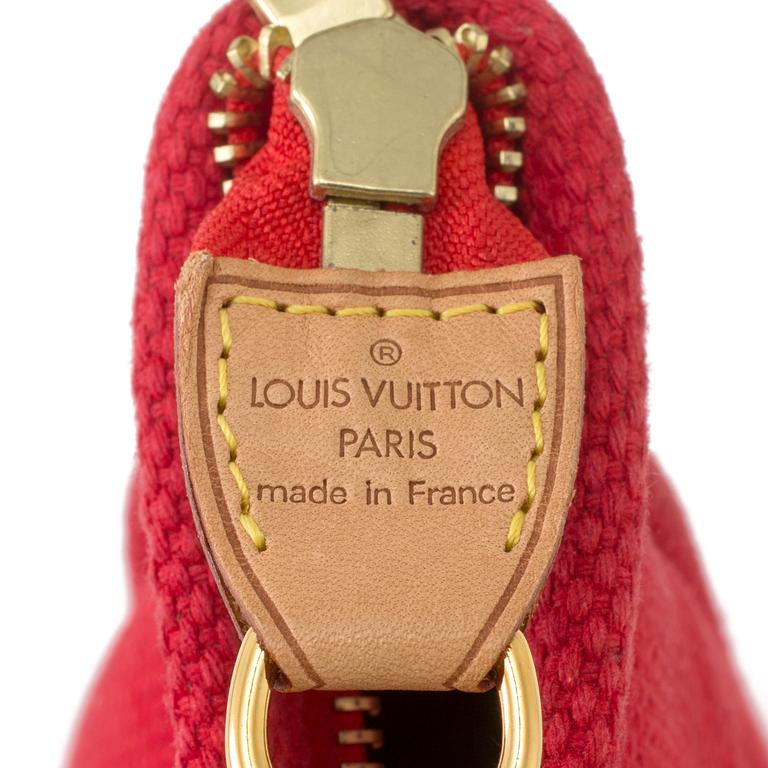 Handbag by Louis Vuitton.