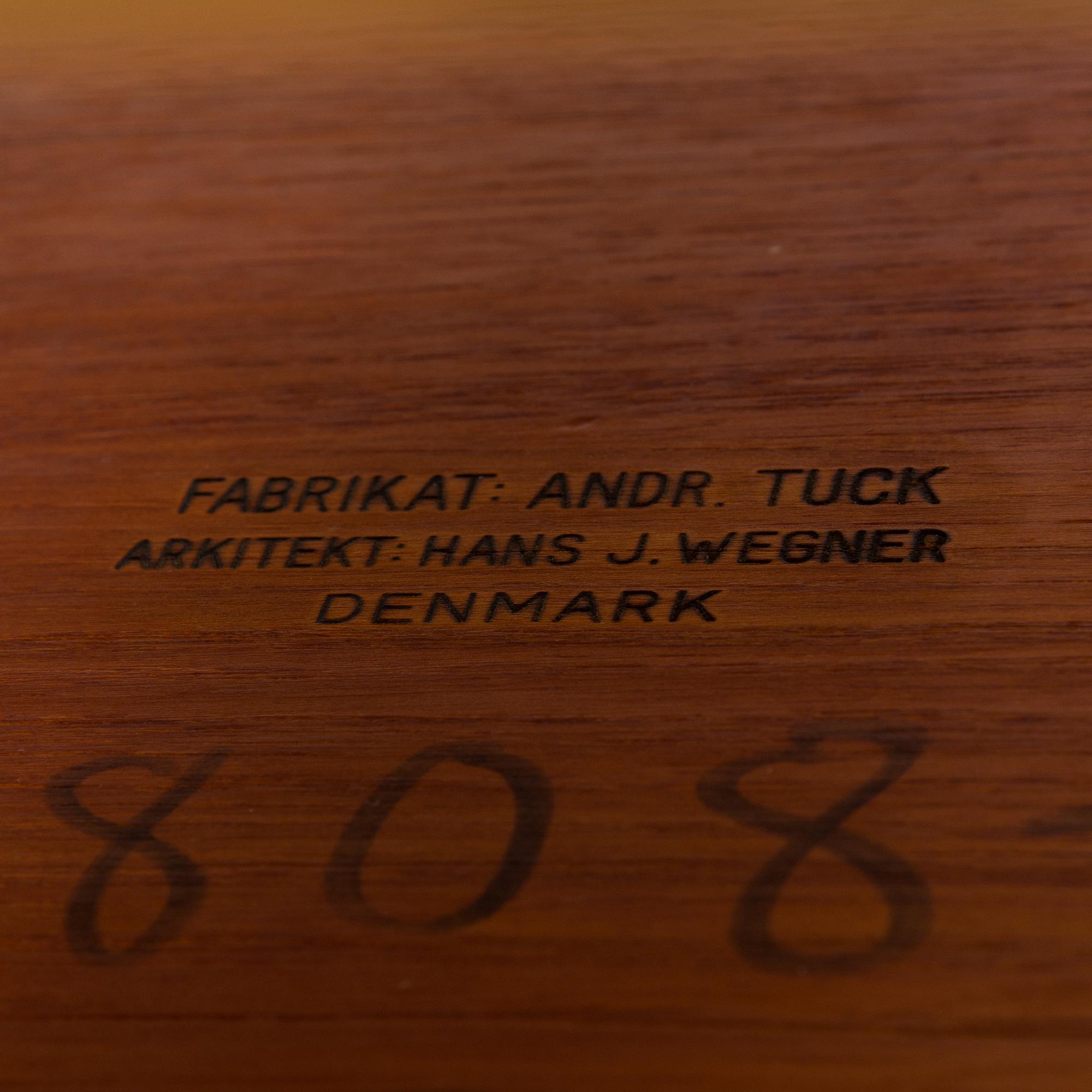 An oak and tek coffee table by Hans J Wegner for Andreas Tuck, 1960s.
