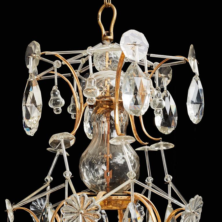 A pair of Swedish Rococo 18th century six-light chandeliers by Olof Westerberg dated 1789 and 1790.