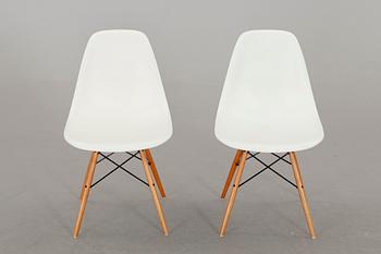 A PAIR OF "PLASTIC CHAIR" BY CHARLES & RAY EAMES, Vitra 2009.