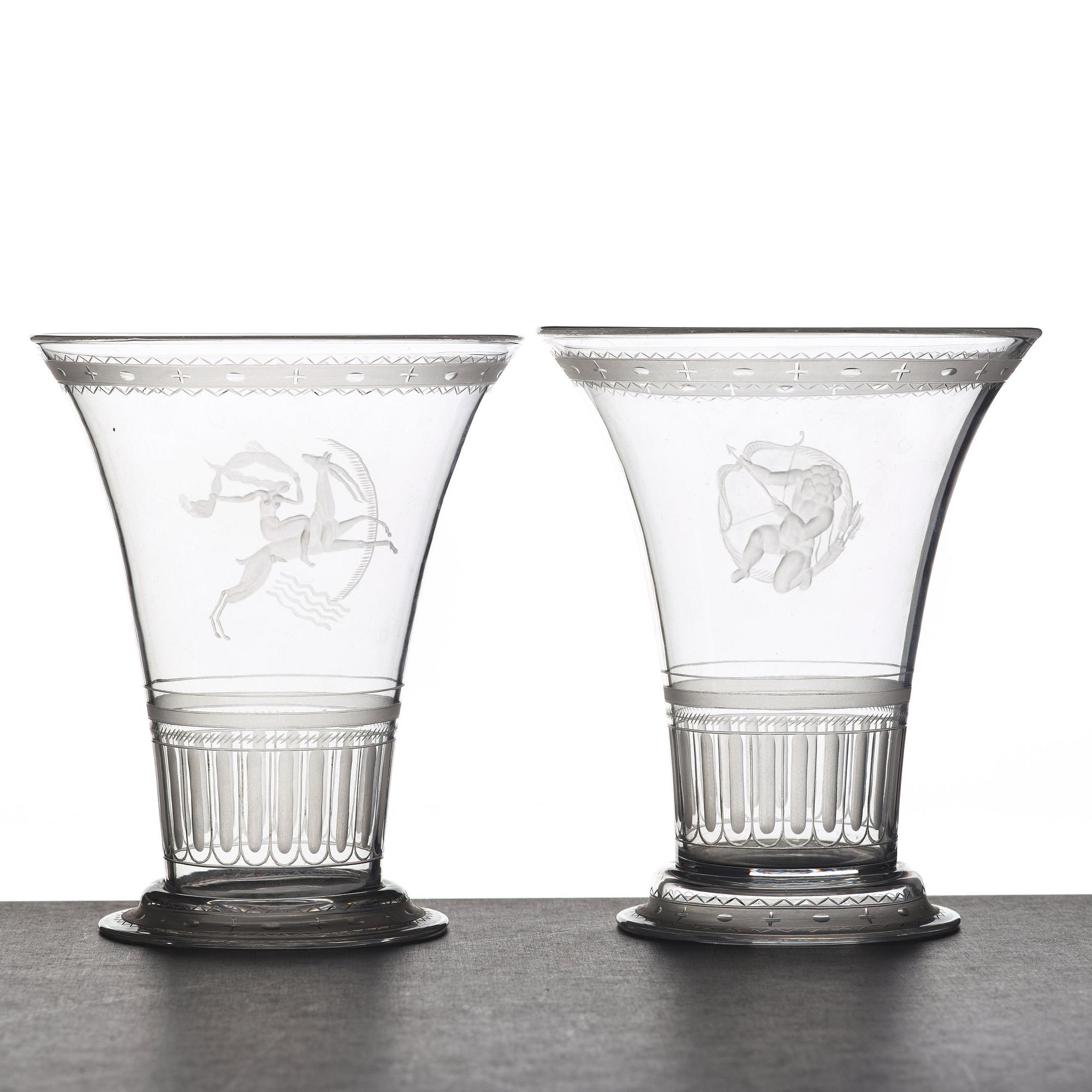 Simon Gate, two Swedish Grace engraved glass beakers, Orrefors, Sweden 1924.