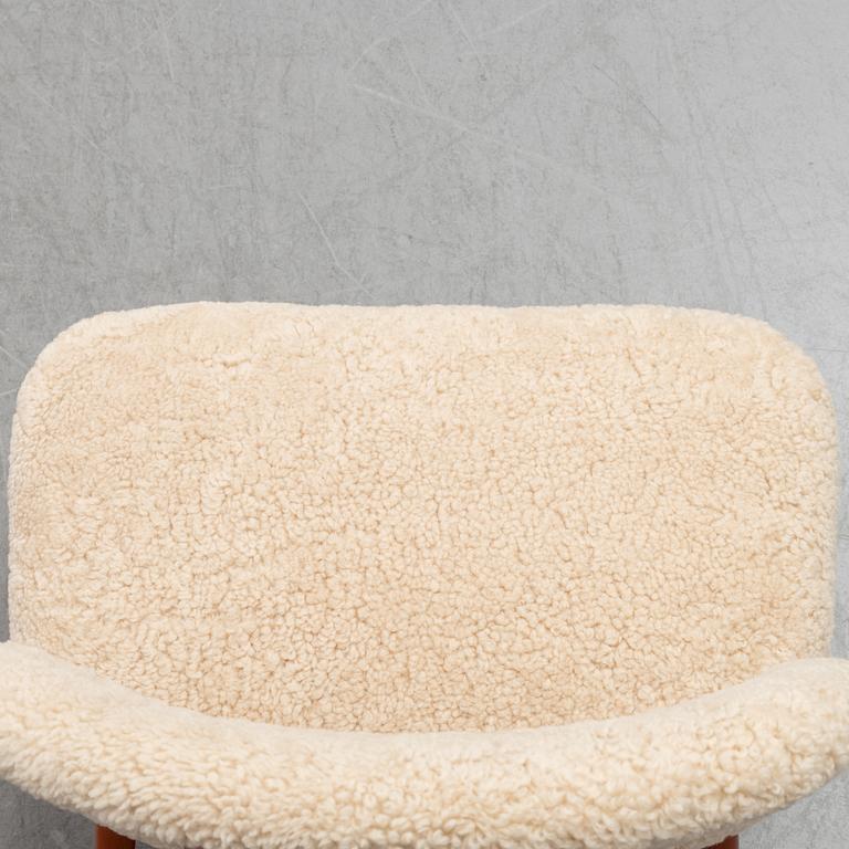 A 1950's pair of 'TeVe' easy chairs by Alf Svensson.