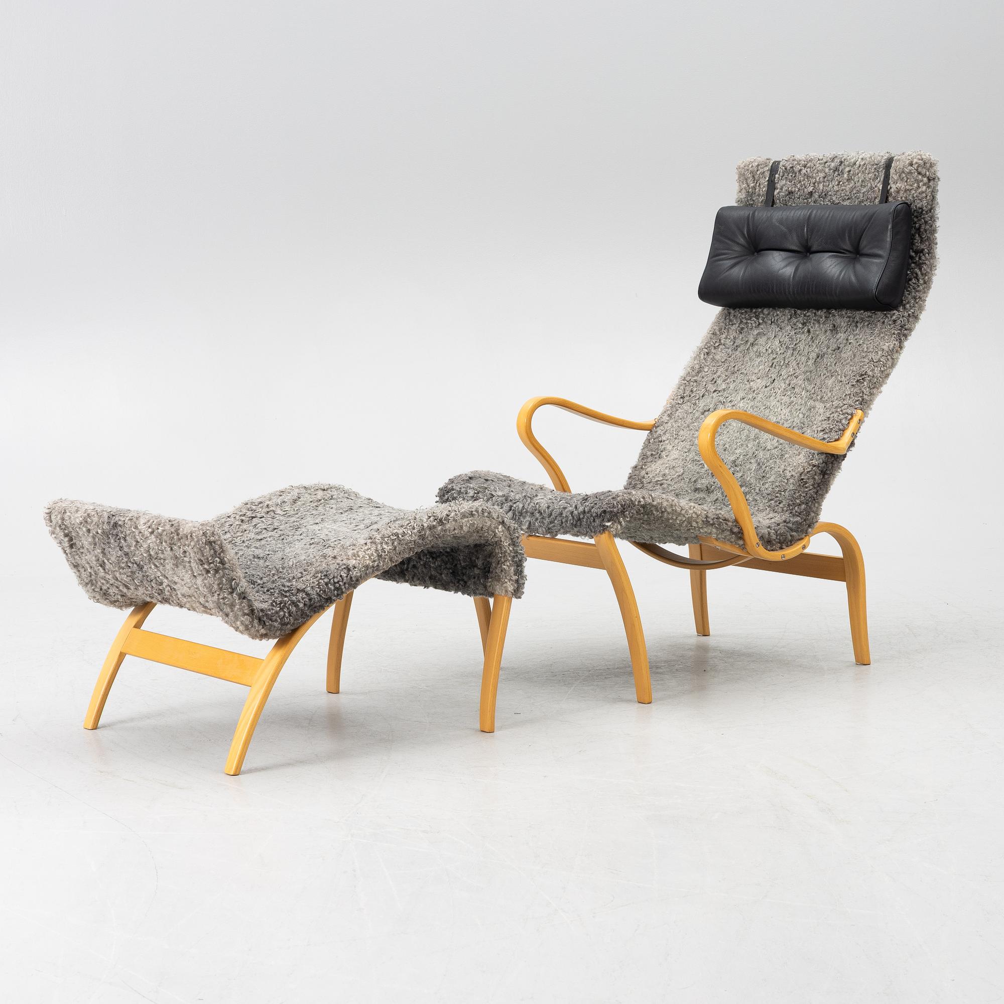 Bruno Mathsson, a 'Miranda' armchair and ottoman, Bruno Mathsson International, Värnamo, 2001.