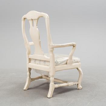 An early 18th century rococo chair.