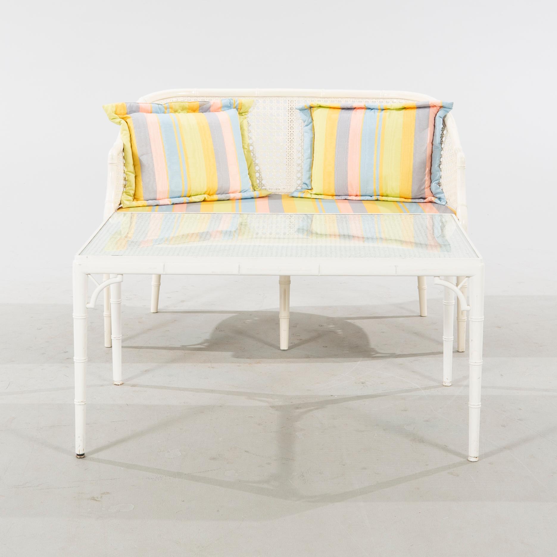 A late 20th century Miranda sofa and table.