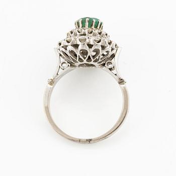 Ring, with emerald and brilliant-cut diamonds.