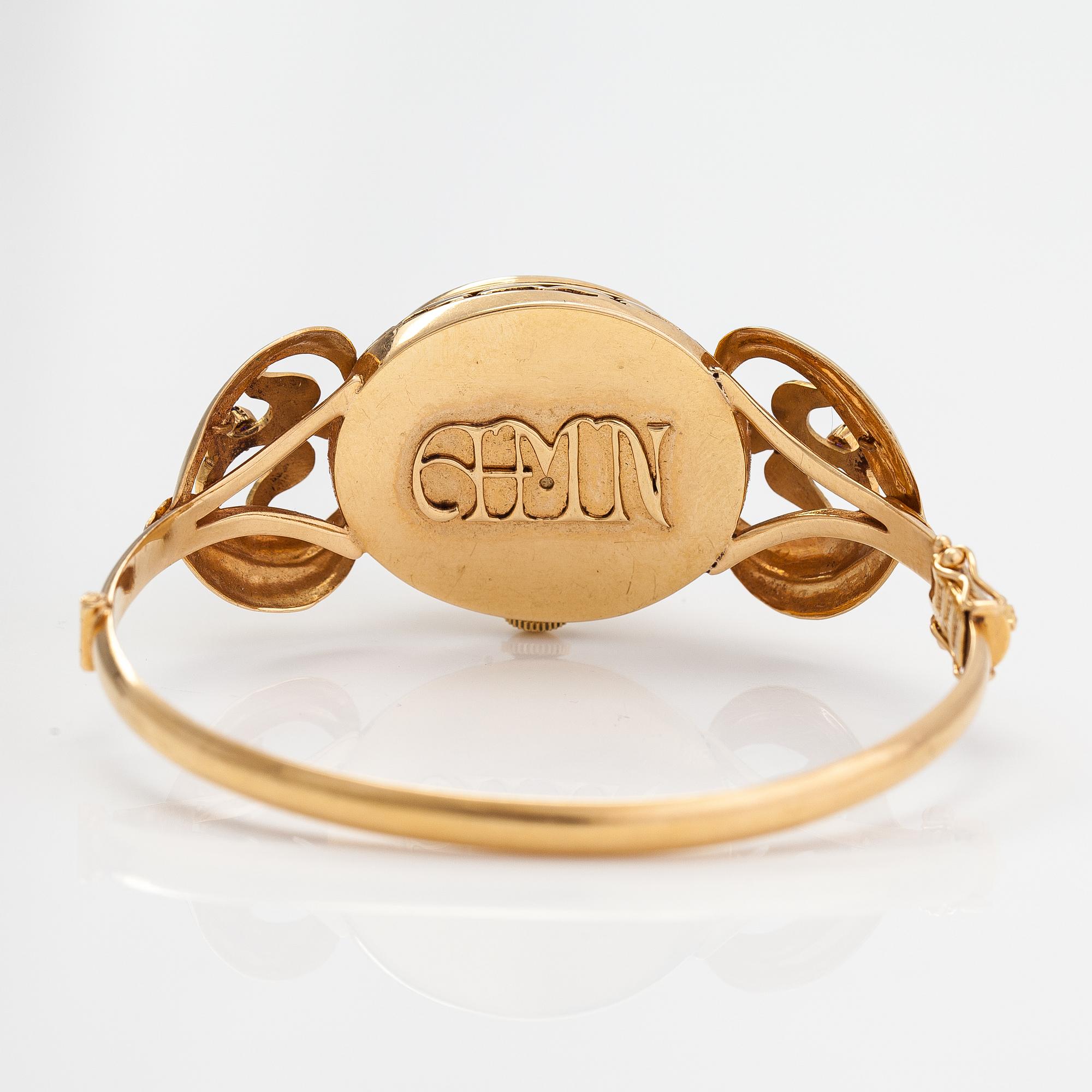 Armband/armbandsur, örhängen och brosch, 18K guld, ametister, syntetiska korunder och odalde pärlor.