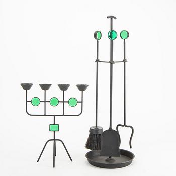 A set of three metal and glass fire place utensils and a candlestick by Gunnar Ander, second half of the 20th century.