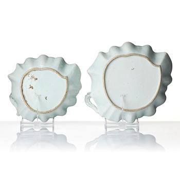 A pair of leaf shaped 'European subject' dishes, Qing dynasty, 18th century.