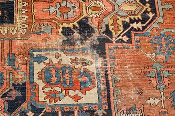 A carpet, an antique Heriz, ca 469,5-471 x 300-309,5 cm.