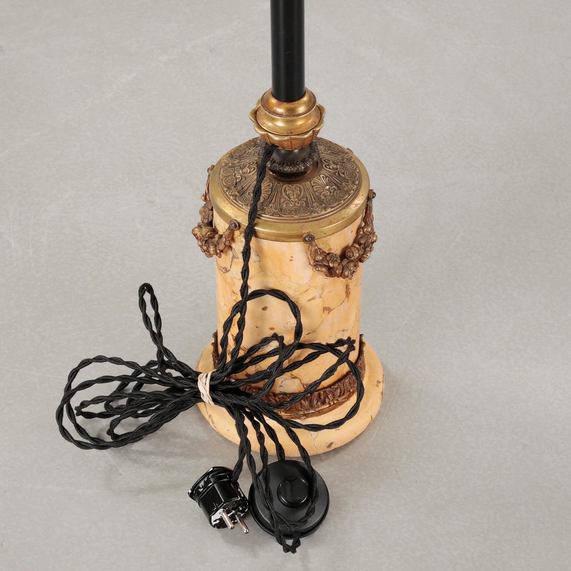 A floor lamp, made in the first half of the 20th century.