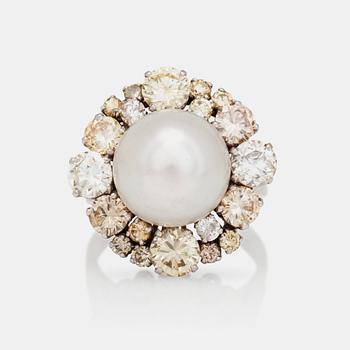 1266. A probably natural saltwater pearl and multi-coloured diamond ring.
