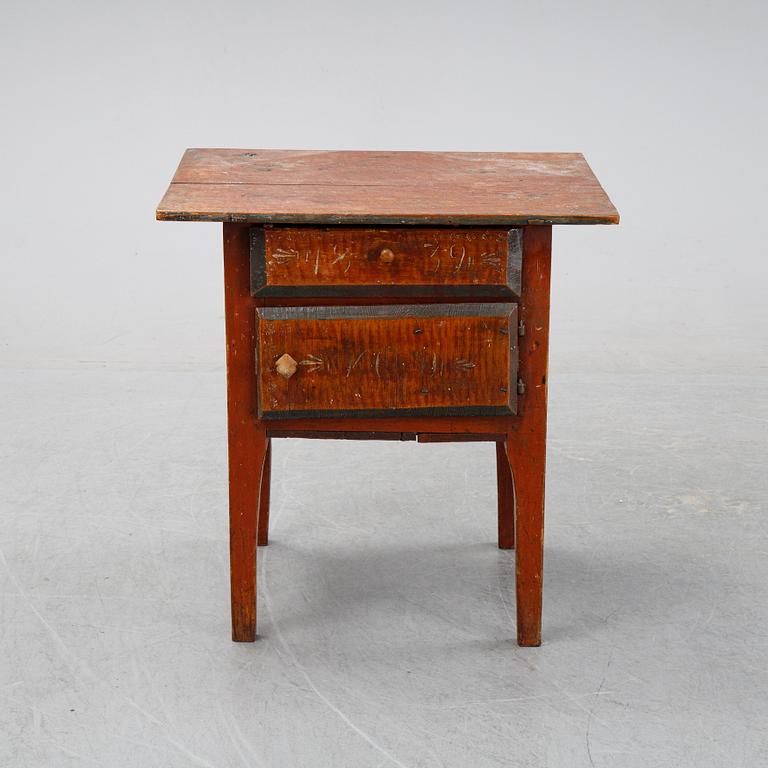 A swedish wooden table from Hälsingland, first half of the 19th century.