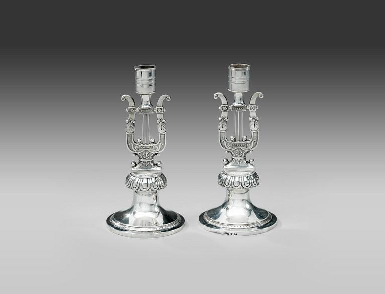 A PAIR OF SWEDISH CANDLESTICKS.