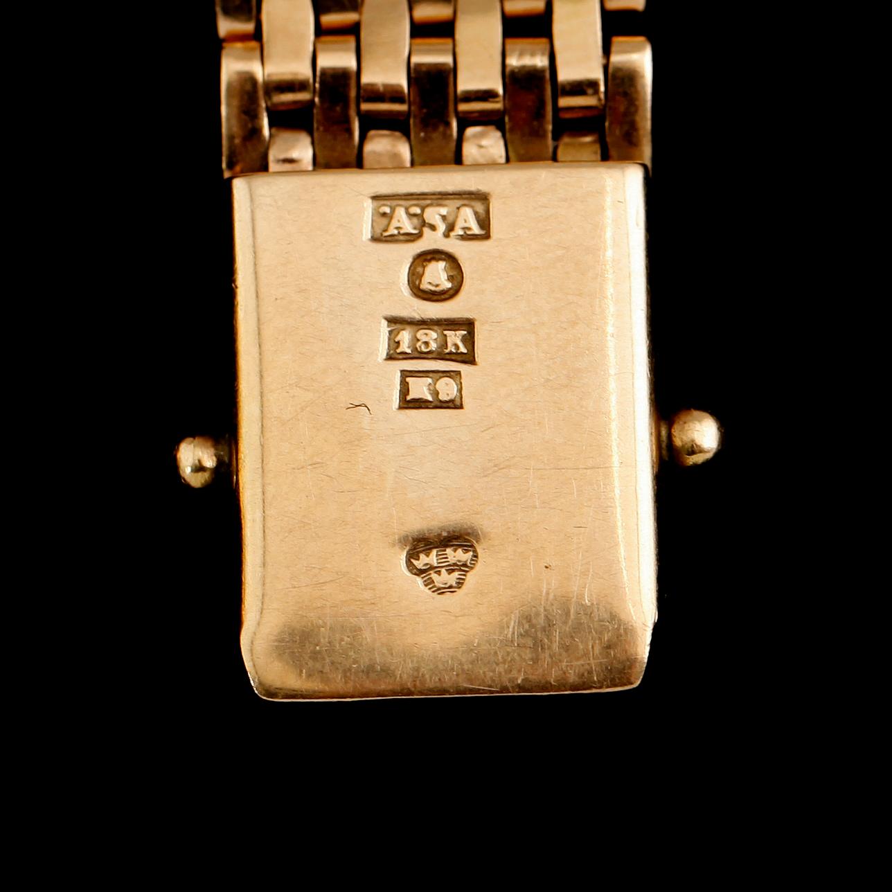 ARMBAND, 18 k guld, svenska stämplar Stockholm 1960. Vikt ca 27 g.
