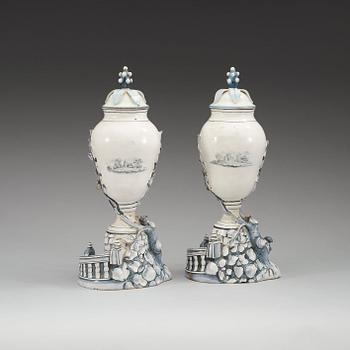A pair of Swedish Marieberg faience vases with covers, 18th Century.