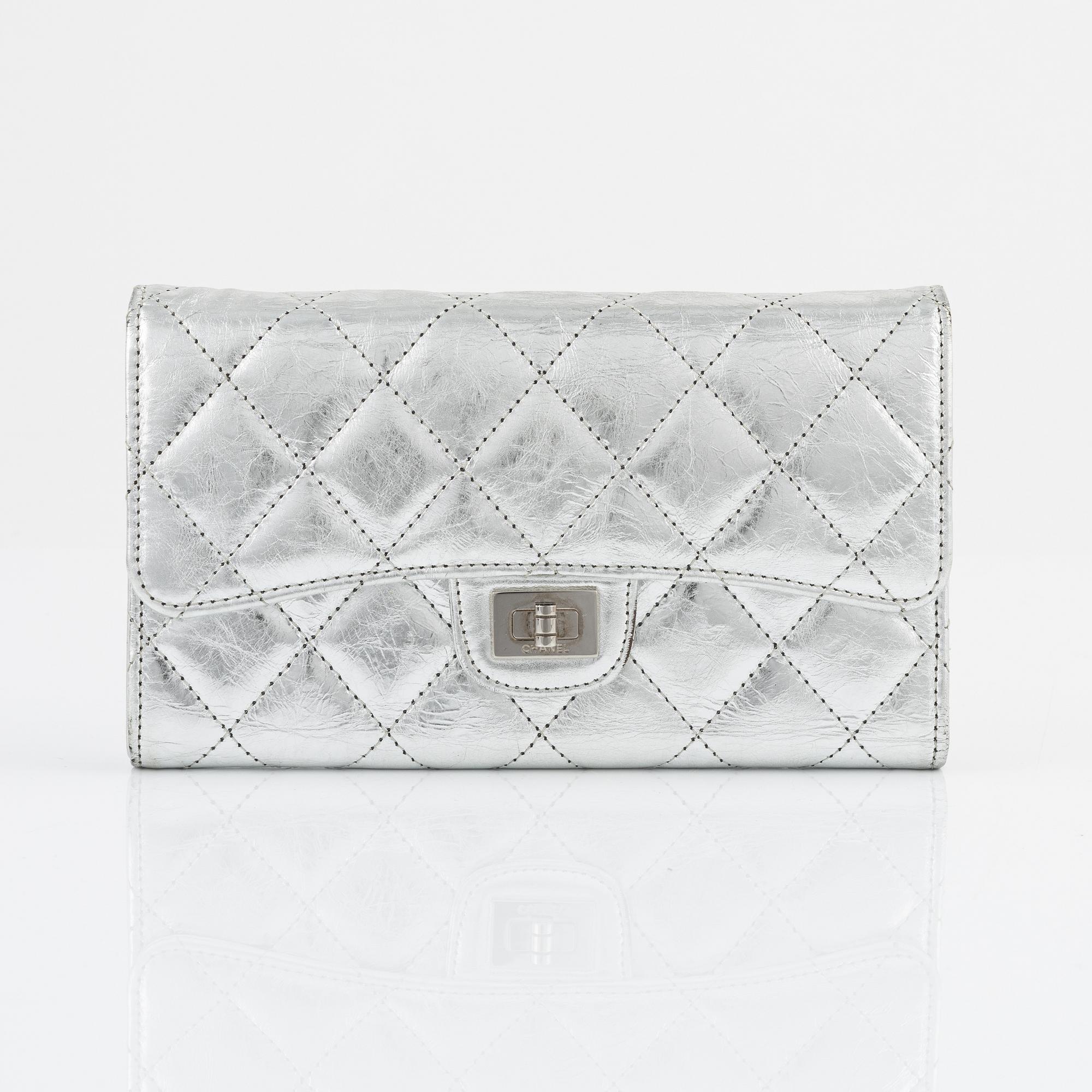 Chanel, a quilted silver leather wallet, 2006-08.