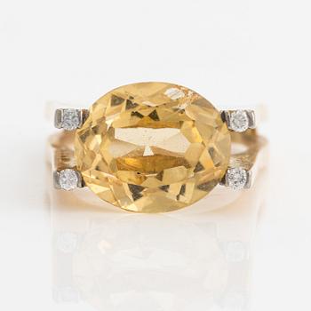 Ring in 18K gold with a faceted citrine and round brilliant-cut diamonds, Stockholm 1975.