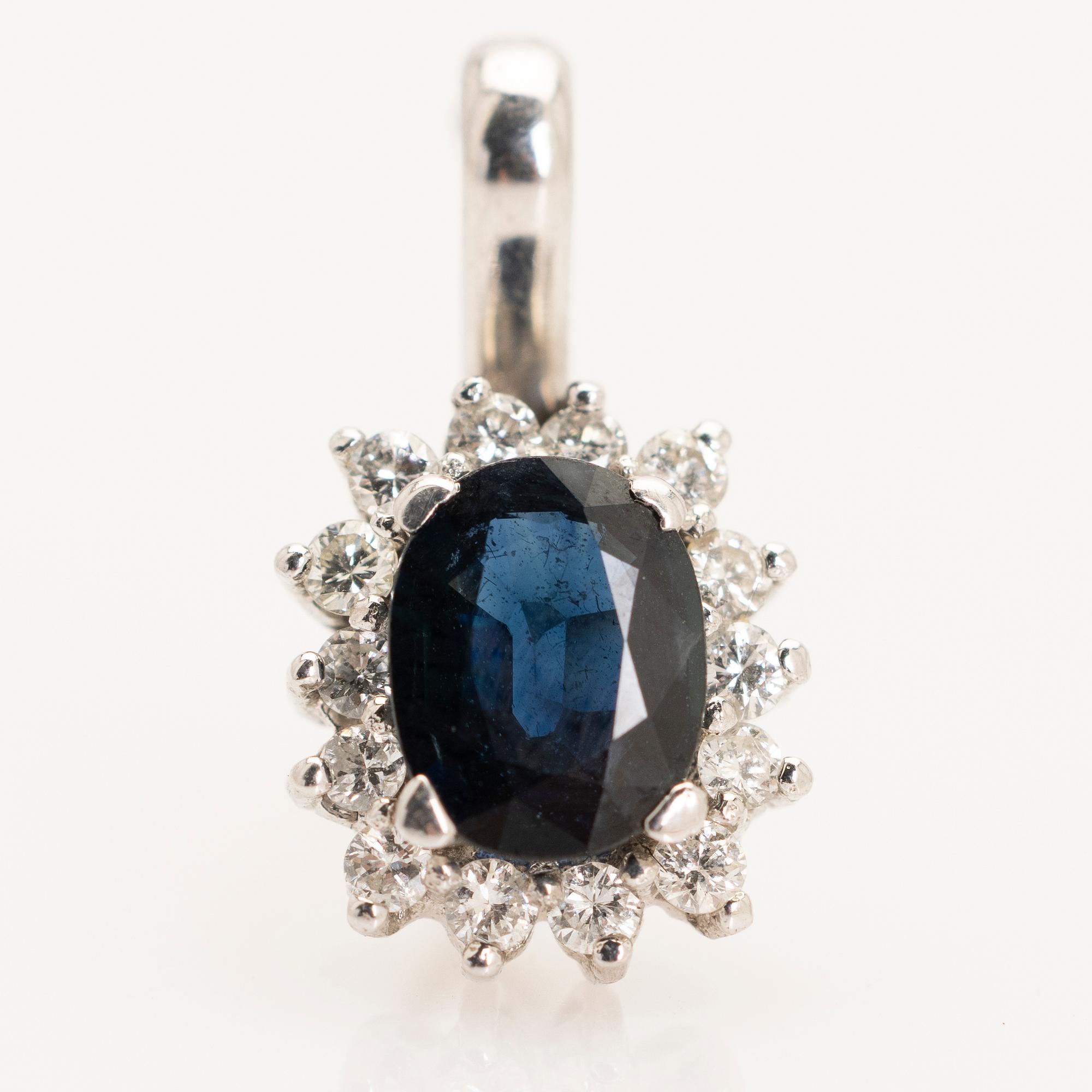 Pendant, 18K white gold with sapphire and diamonds.