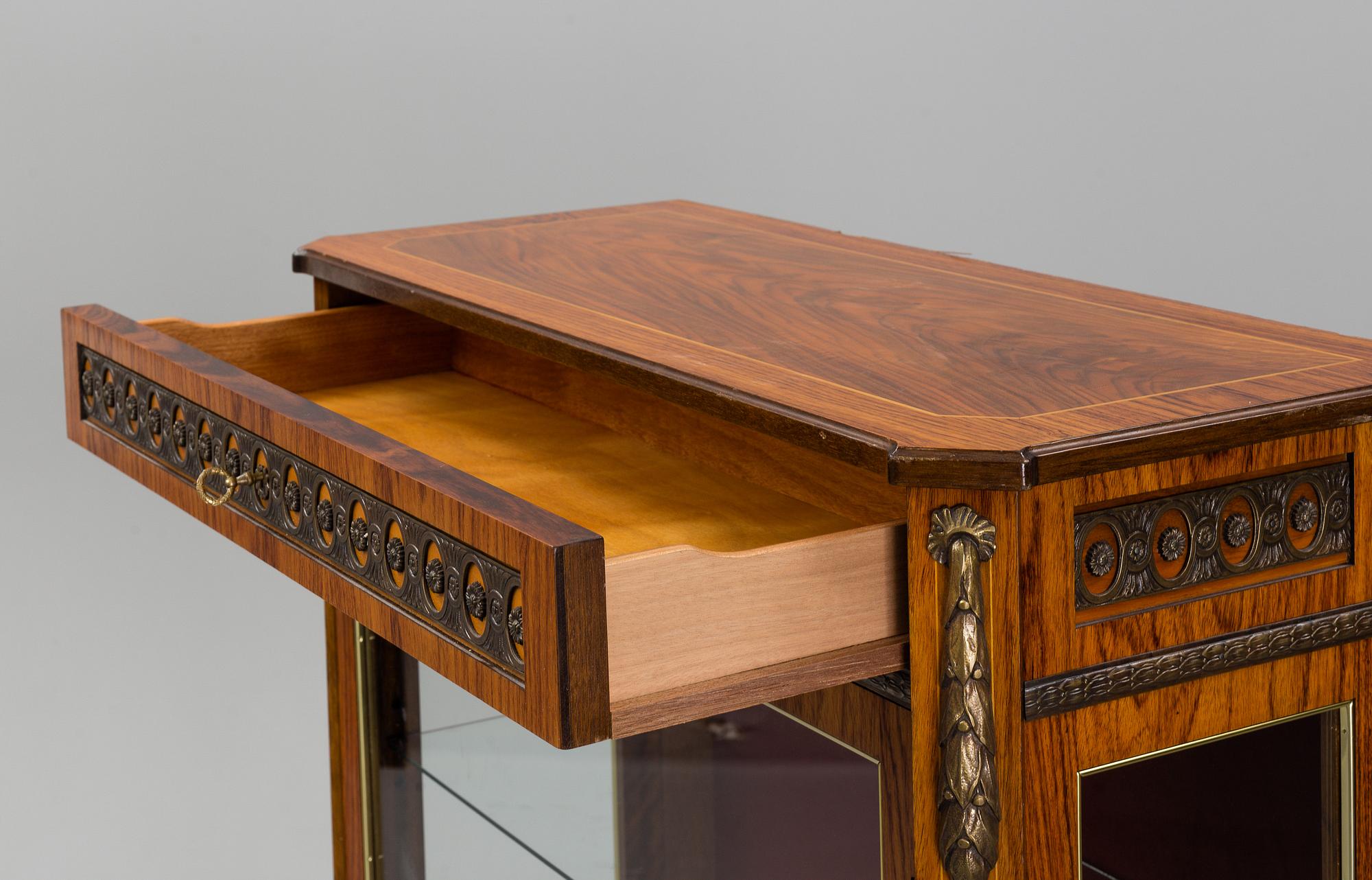 A Louis-XVI style display cabinet, third quarter of 20th century.