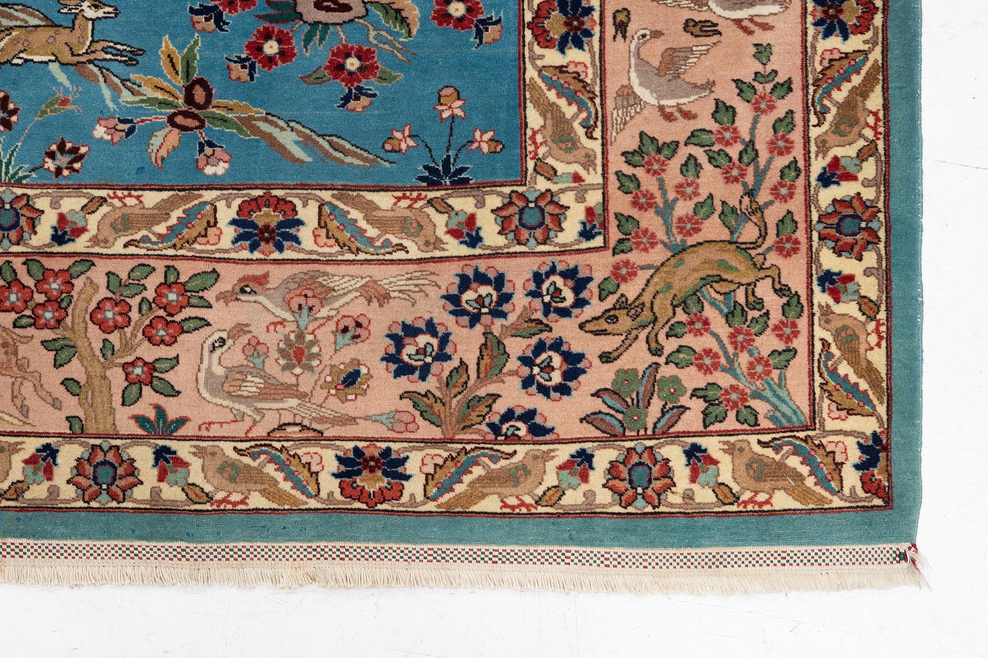 A Tabriz carpet of 'Hunting' design, northwest persia, c. 290 x 200 cm.