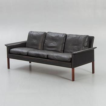 A 1960/70s leather sofa.