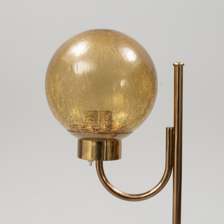 Bergboms, a pair of model 'G-118', brass and glass floor lamps. Second half of the 20th century.
