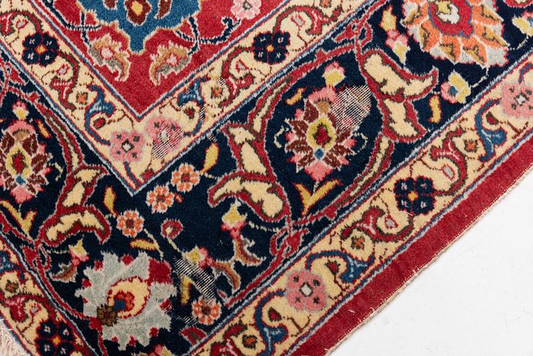 A semi-antique Tabriz carpet, c 358 x 248 cm.