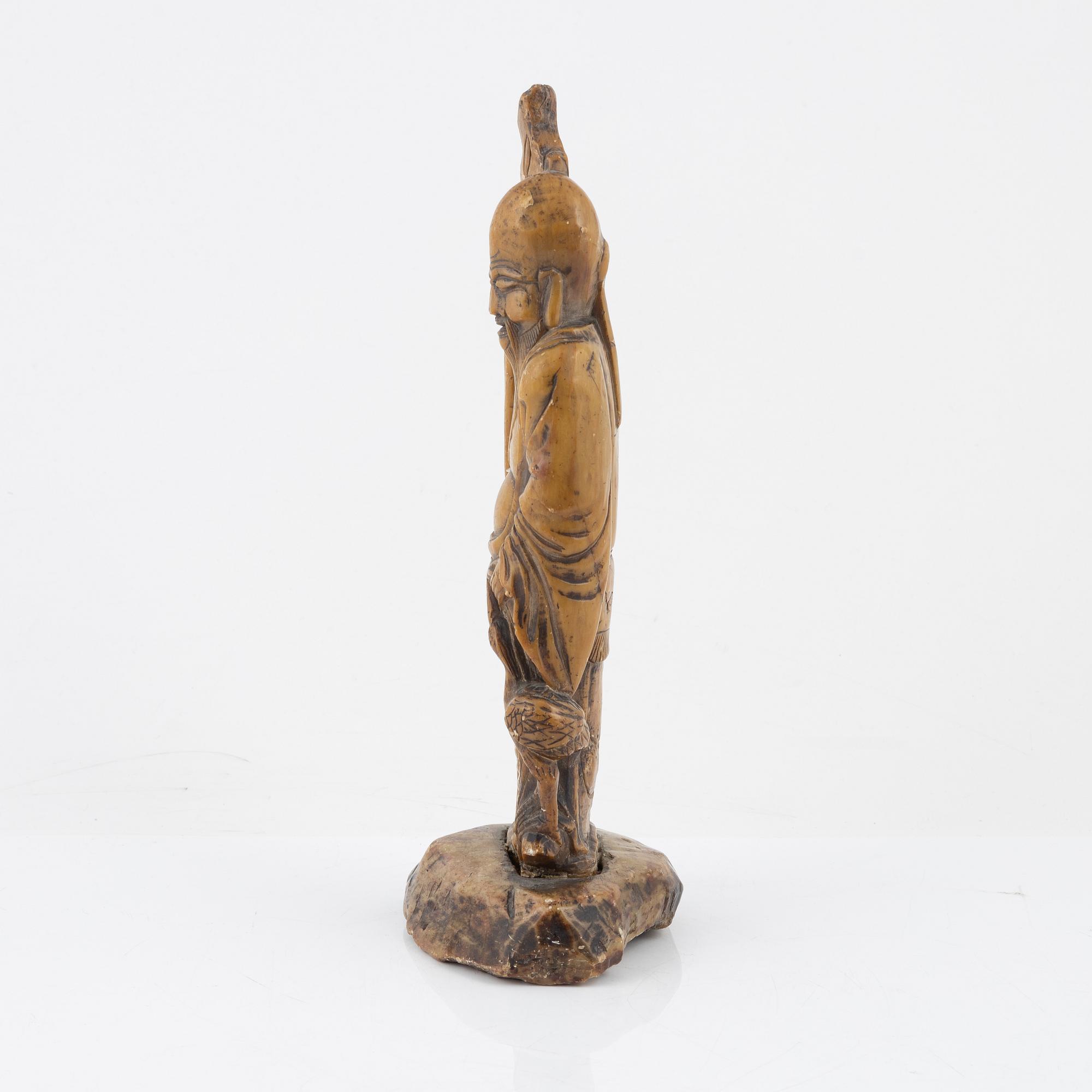 A soapstone figure of sholaou, China, 20th Century.