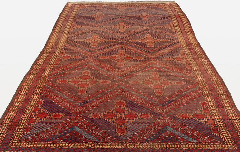 An antique Beshir carpet, c 495 x 206 cm, around the year 1875.