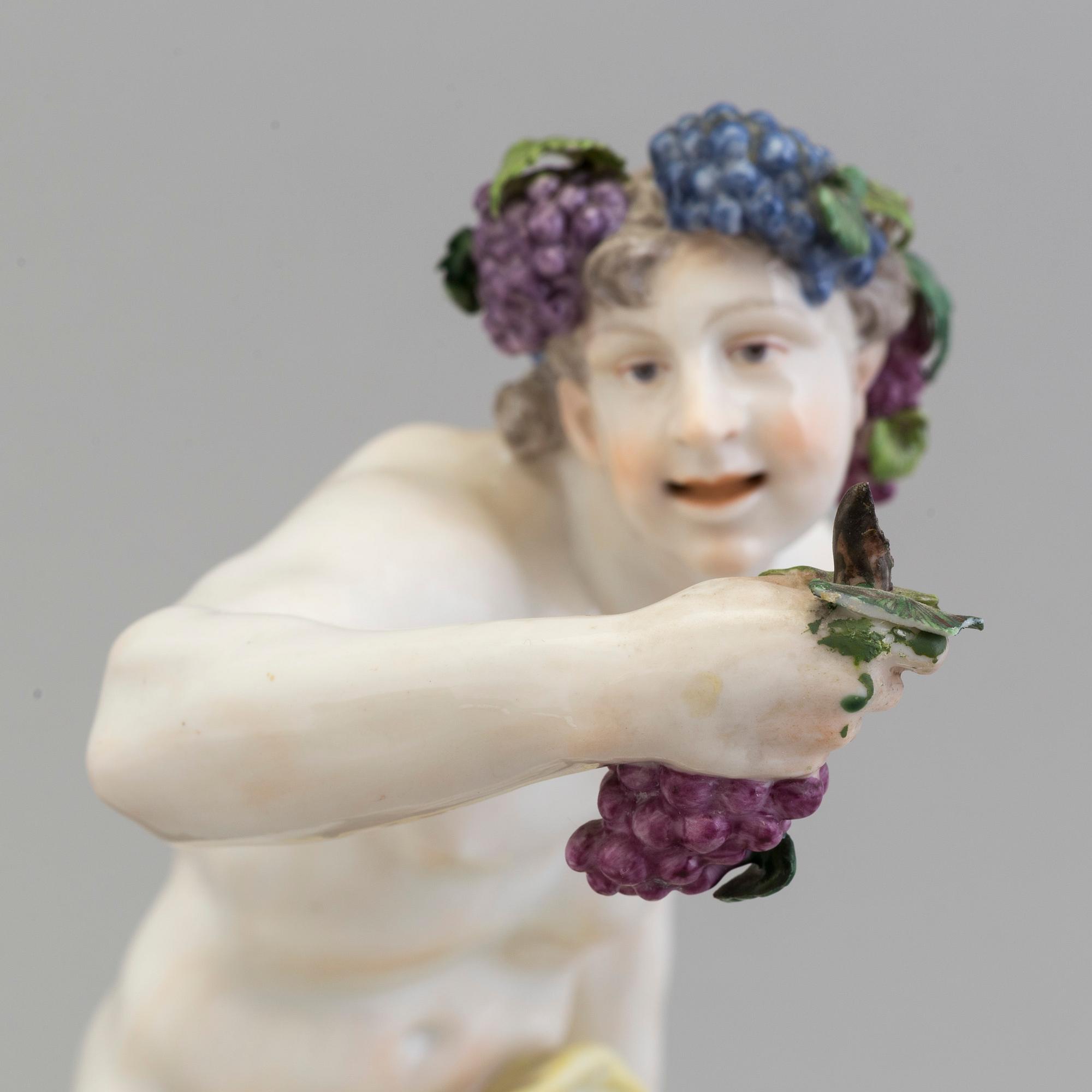 A 20th century porcelain figure of "Bacchus",  model after Dominik Auliczek, Nymphenburg, Germany.