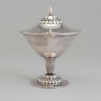 A Swedish Art Nouveau silver lidded bowl on stand, maker's mark CF Carlman, Stockholm, 1919.