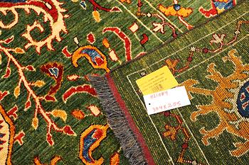 A Kazak carpet, c. 304 x 205 cm.