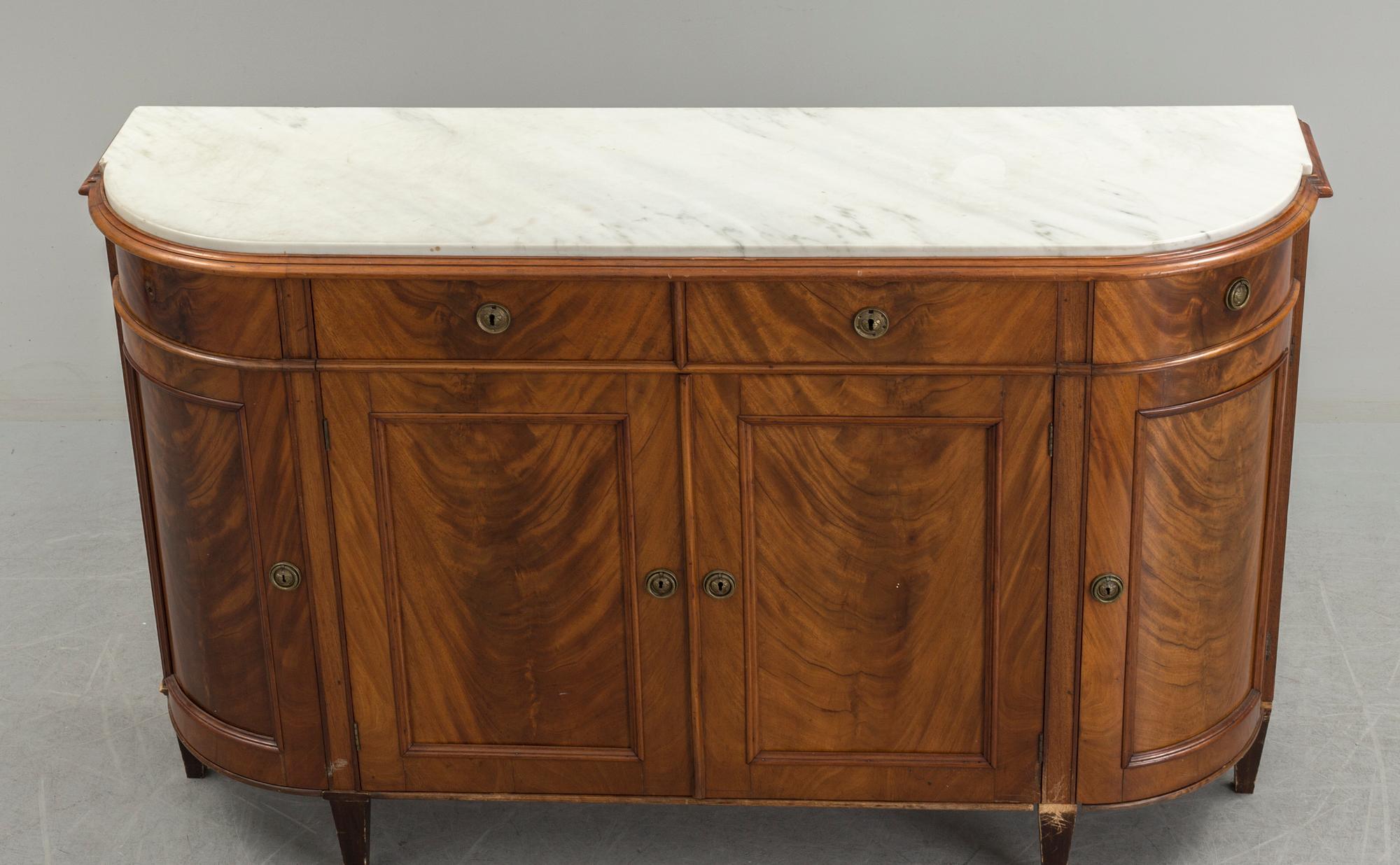 A 20th century marble top sideboard.