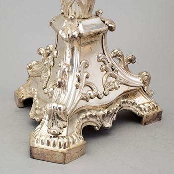 A pair of Neo-Rococo silver candelabra by Gustaf Möllenborg, Stockholm, 1845. Total weight ca 5920 grams.