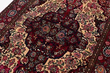 An antique Isfahan rug, Central Persia, c 234 x 146 cm.