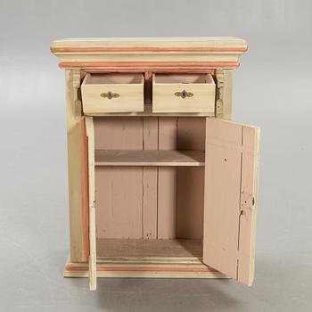 An 18th century painted cabinet.