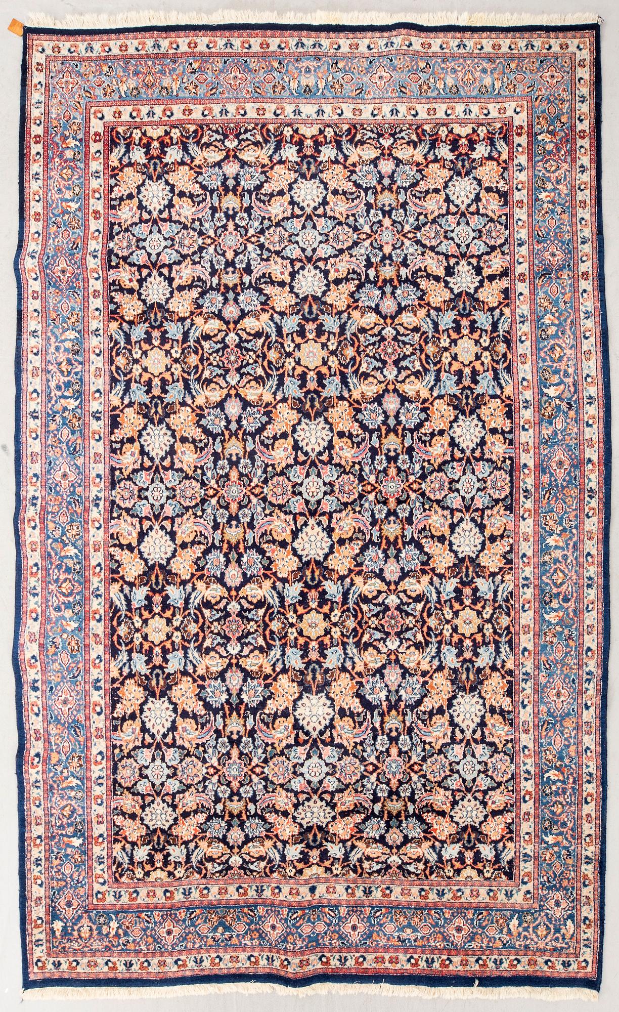 A semiantique Mashad carpet approx 320x220 cm.