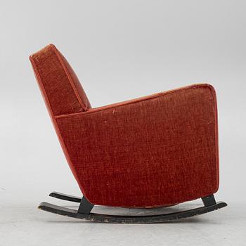 A rocking chair,  1930s.