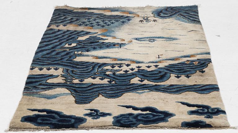 An antique Baotou rug, northern China, c 169 x 88 cm.