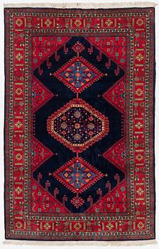 A carpet, possibly Tabriz, c. 342 x 222 cm.