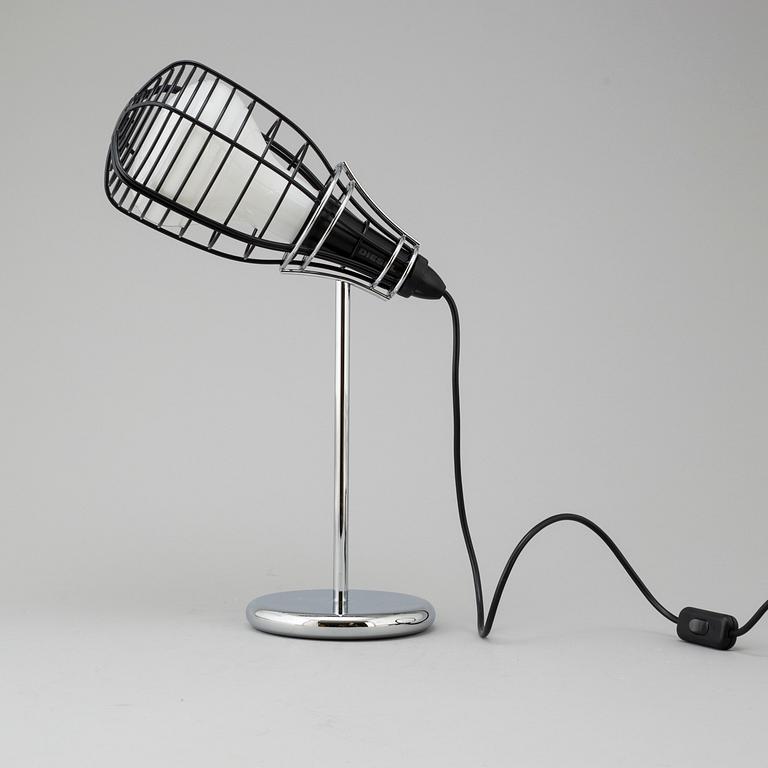A 'Cage Mic' table light by Diesel for Foscarini.