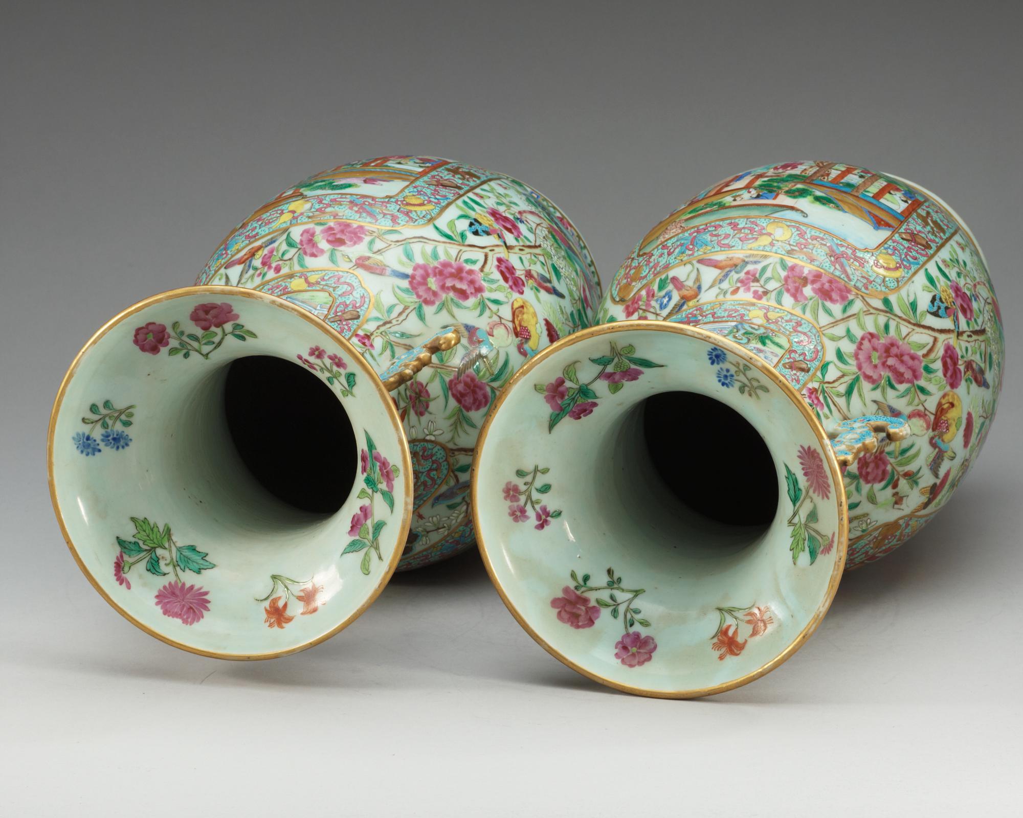 A pair of famille rose Canton vases, Qing dynasty, 19th Century.