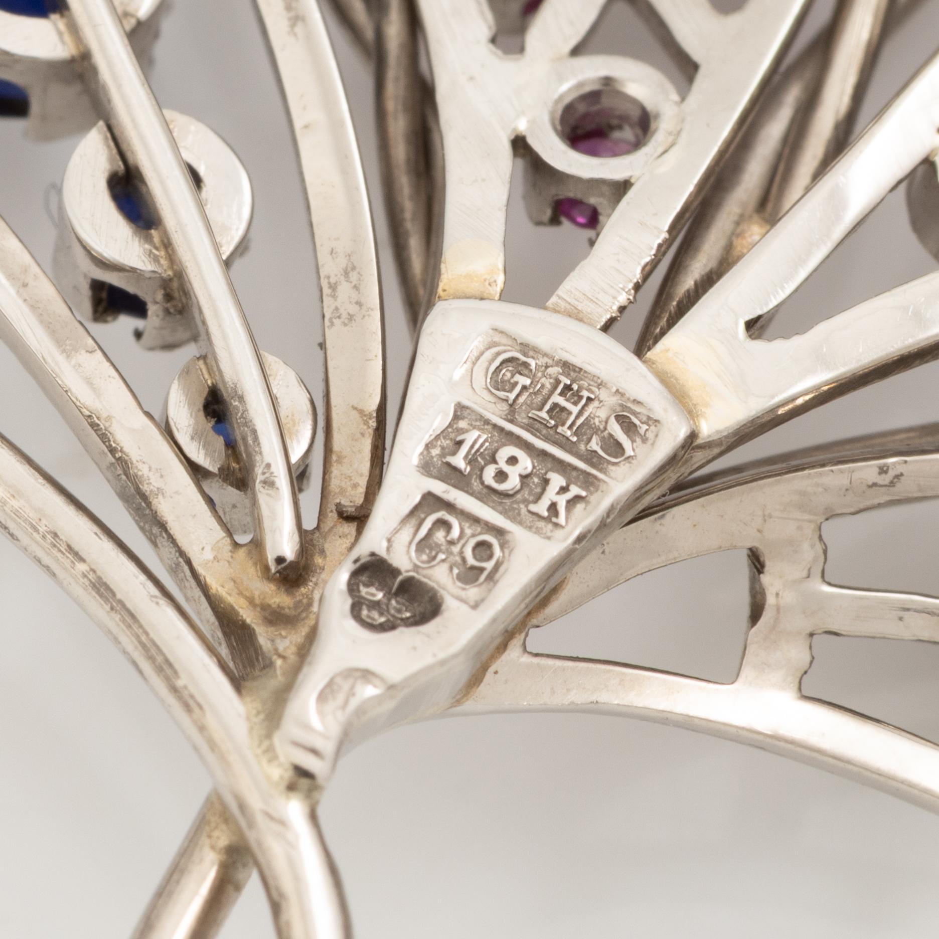 Brooch 18K white gold with white stones and coloured stones. Gerdt Sandqvist, Stockholm 1953.