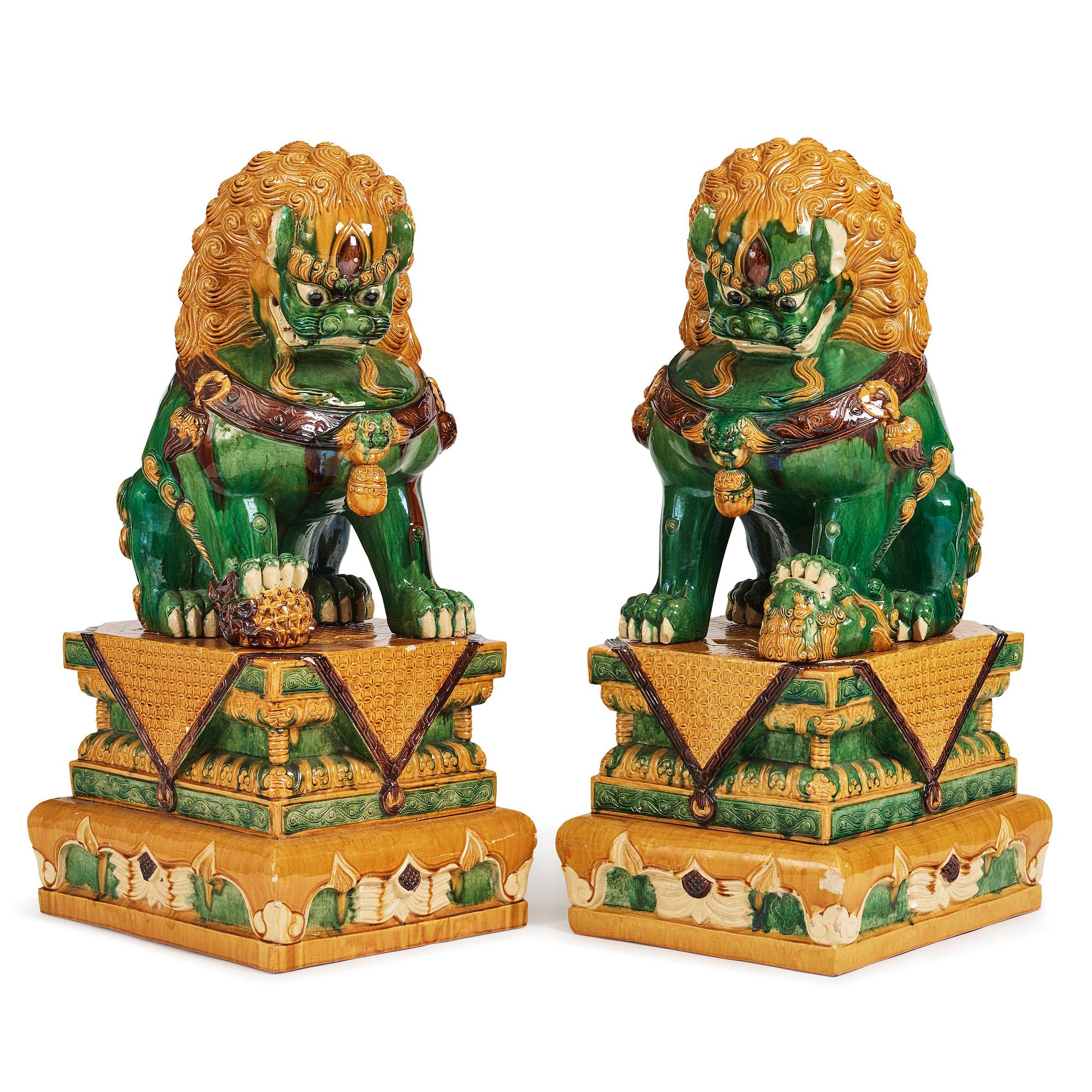 A pair of large buddhist lions, early 20th Century.