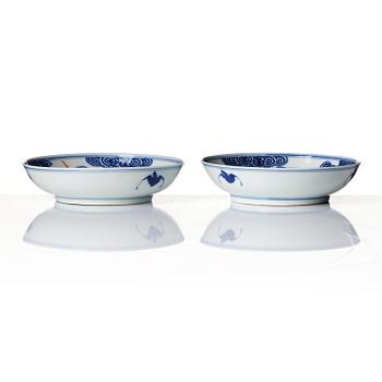 A pair of underglaze blue and and iron-red 'wufu' dishes, Qing dynasty with Guangxu mark and of the period (1875-1908).